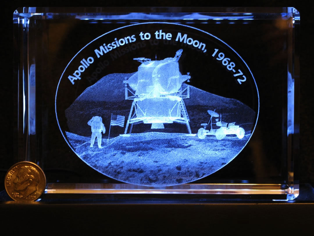 Celebrating the 40th  Anniversary of Apollo on the Moon, a large illuminated 3D sculpture inside solid crystal block. The art was commissioned for the Voyage scale model Solar System in Kansas City. Click on Image for Details